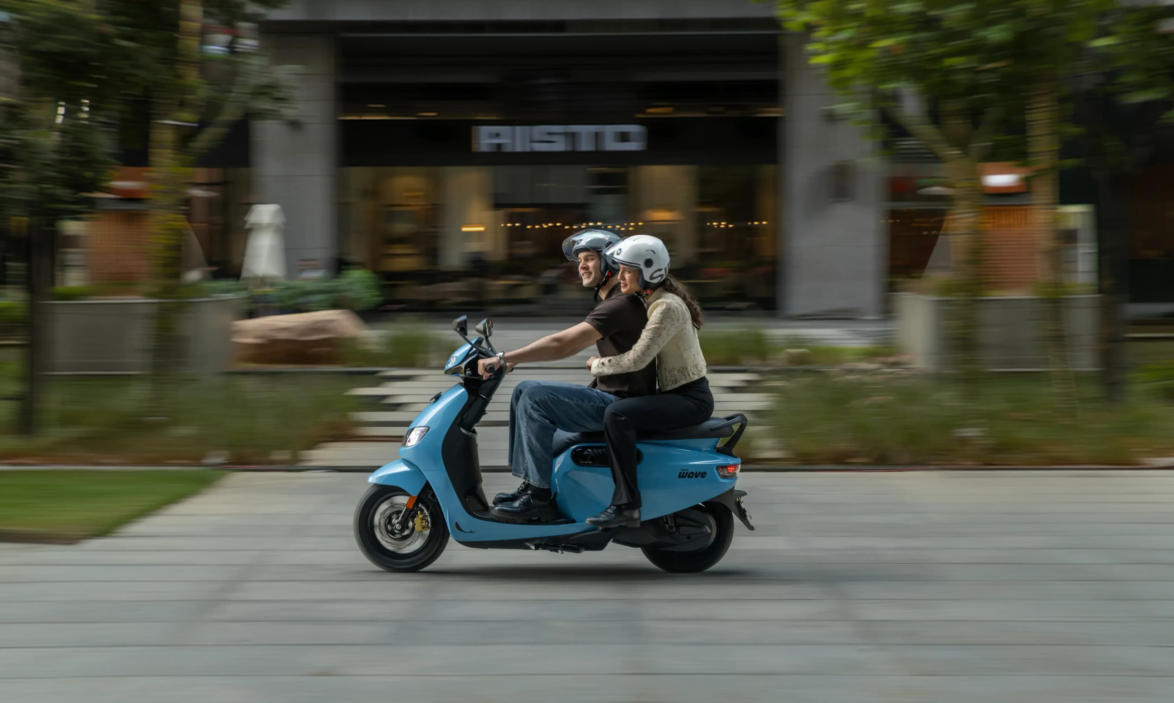 Simple Energy Wave scooter on road — desktop banner